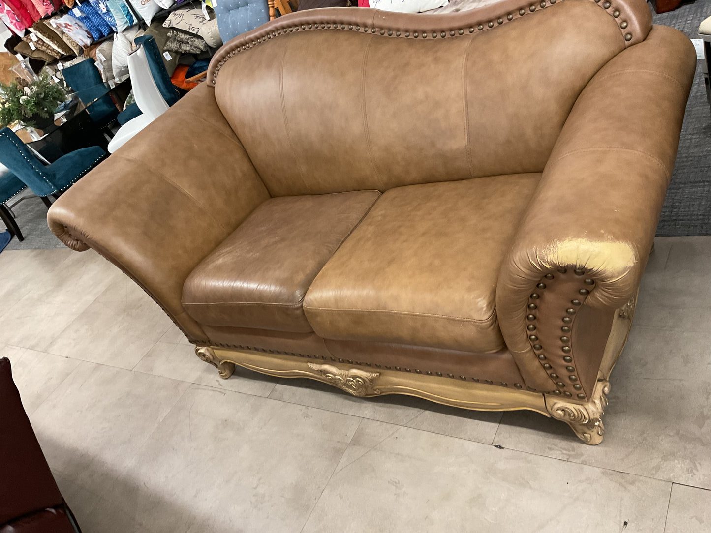 Leather Loveseat On Ornate Wood Base