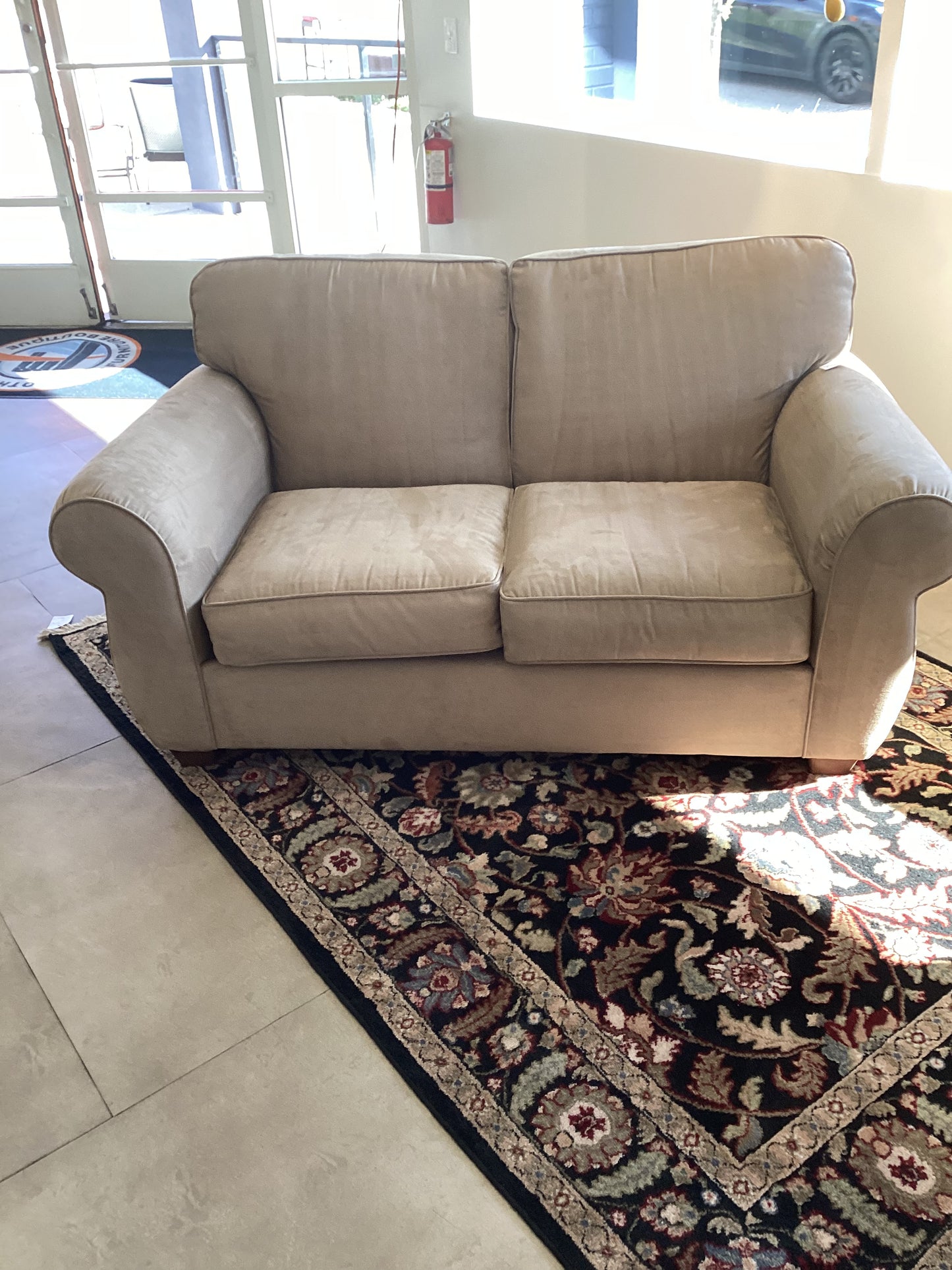 Tan Loveseat