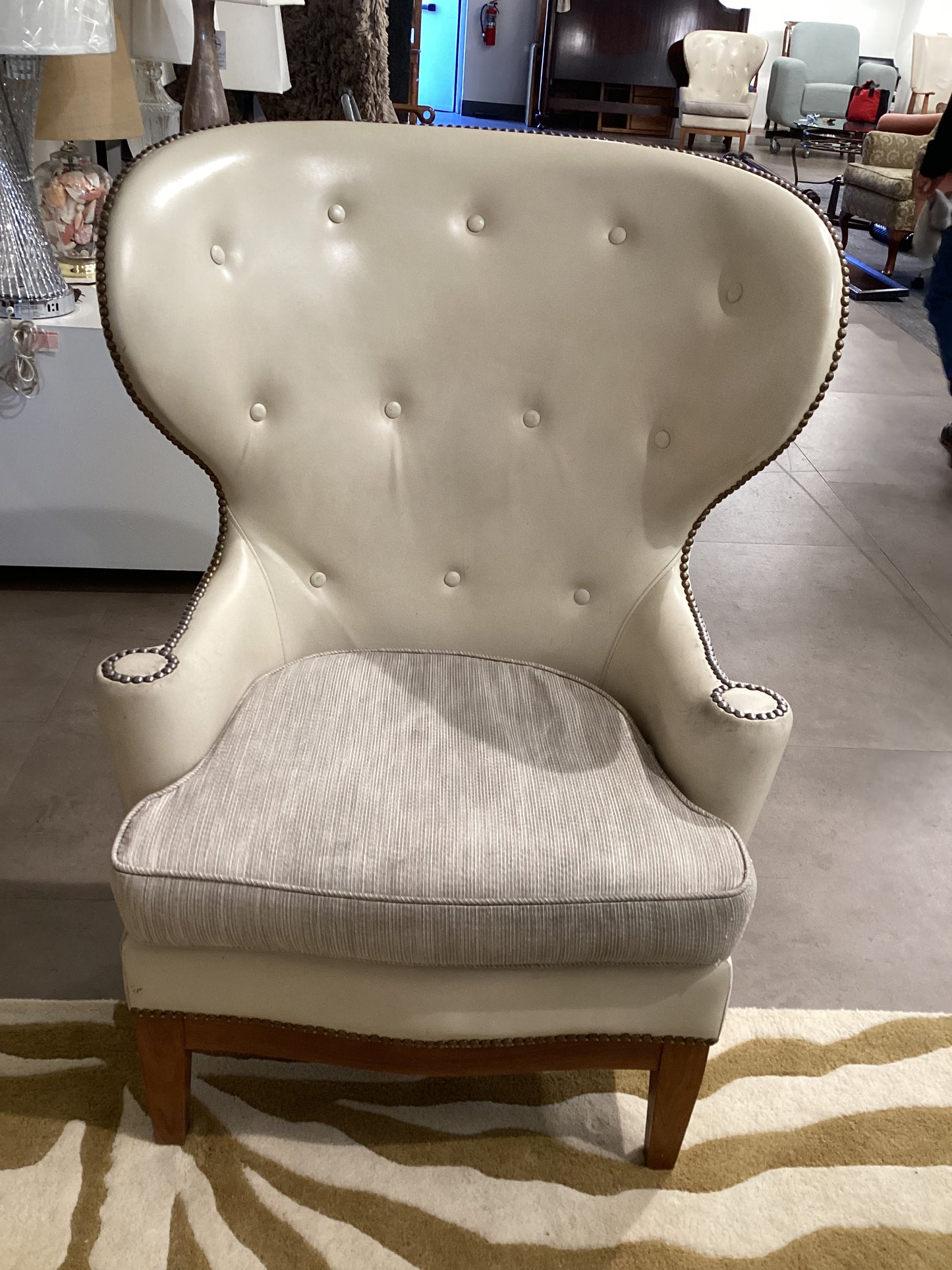 Cream leather wingback chair