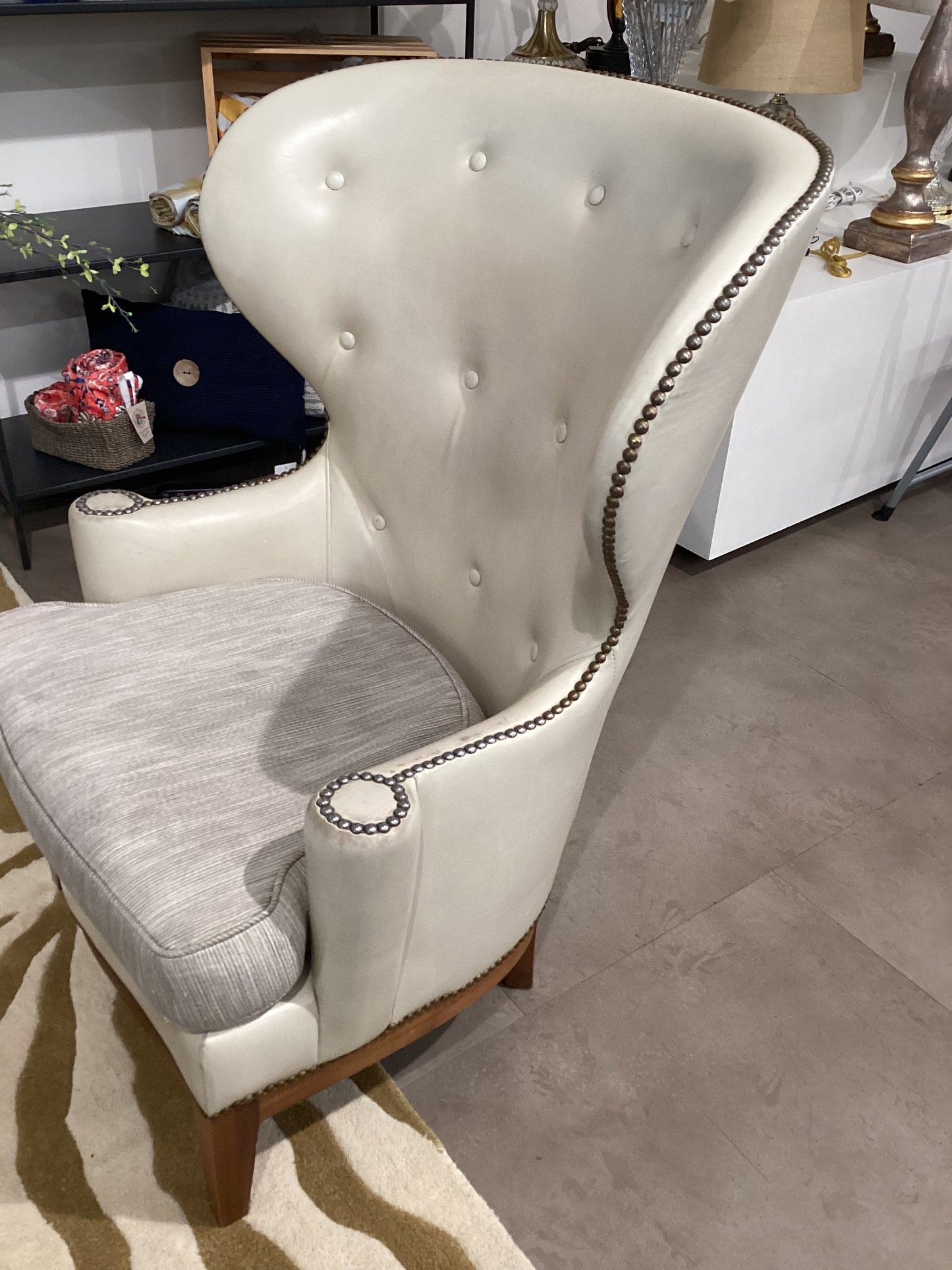 Cream leather wingback chair