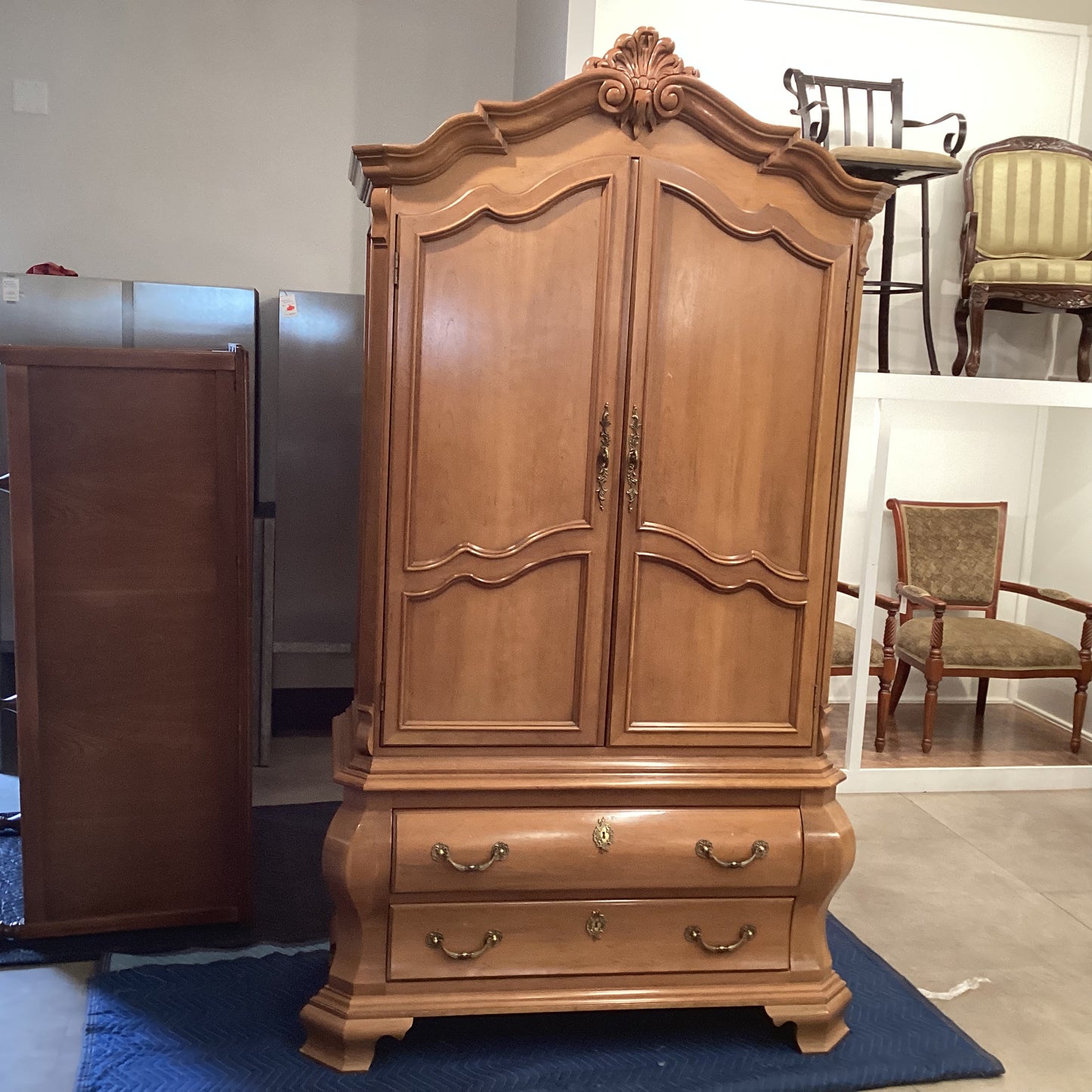 Light wood antique armoire