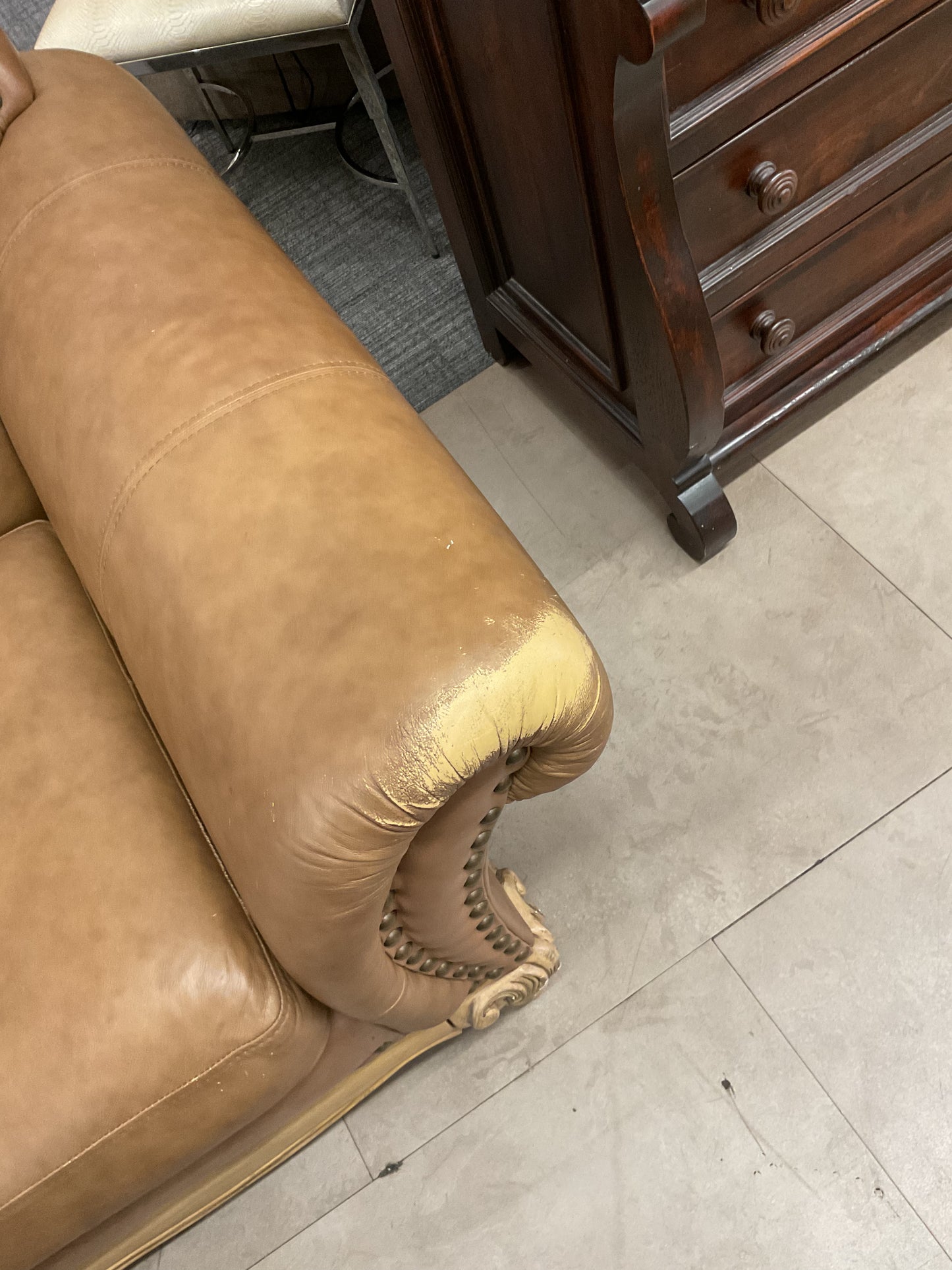 Leather Loveseat On Ornate Wood Base